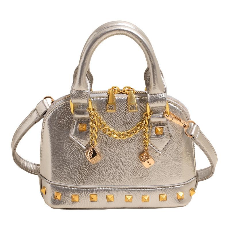 Минималистичная сумка-ракушка для женщин из искусственной кожи с металлическими заклепками, повседневная кроссбоди для весенних нарядов