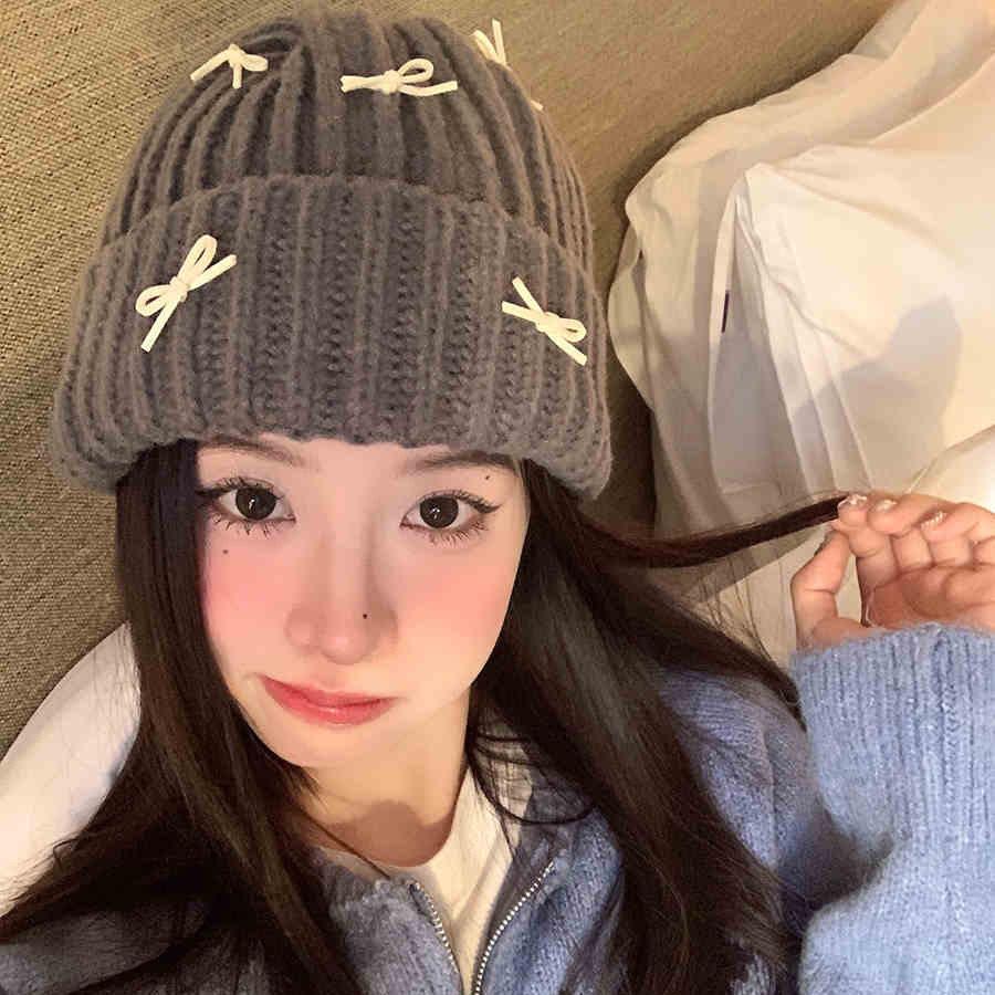 Autumn and winter students warm wool hat elastic pullover knitted hat sweet cute bow cold hat woman