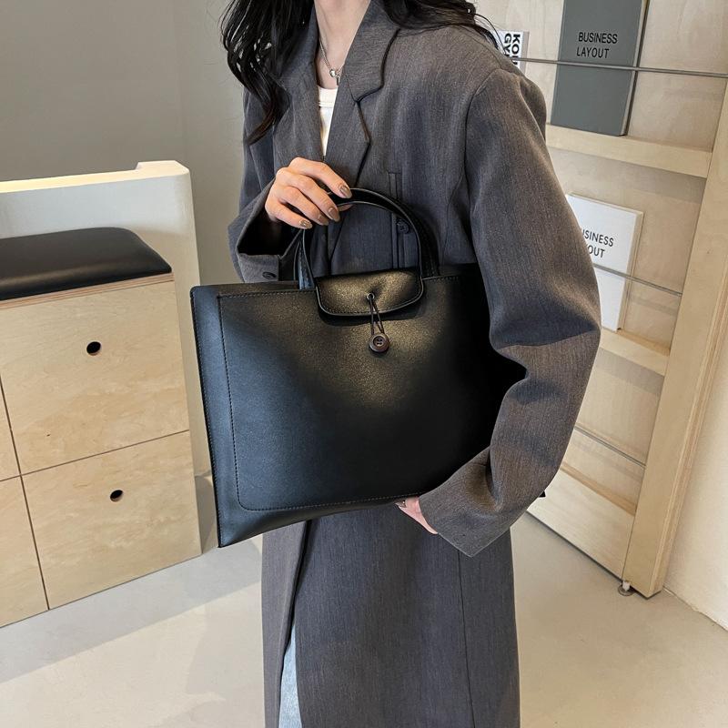 Сумка женская большой вместимости 2025 новая модная с ощущением высокого класса зарубежная универсальная ручная сумка популярная портативная сумка-тоут для компьютера