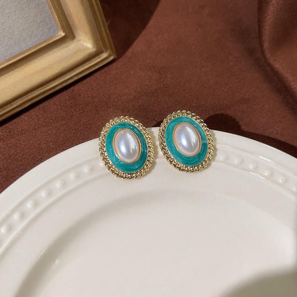 Изумрудные серьги-пусеты в стиле ретро середины века
