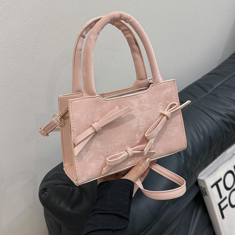 Модная женская сумка иностранного стиля с нежной текстурой и однотонным бантом. Маленькая женская сумка.