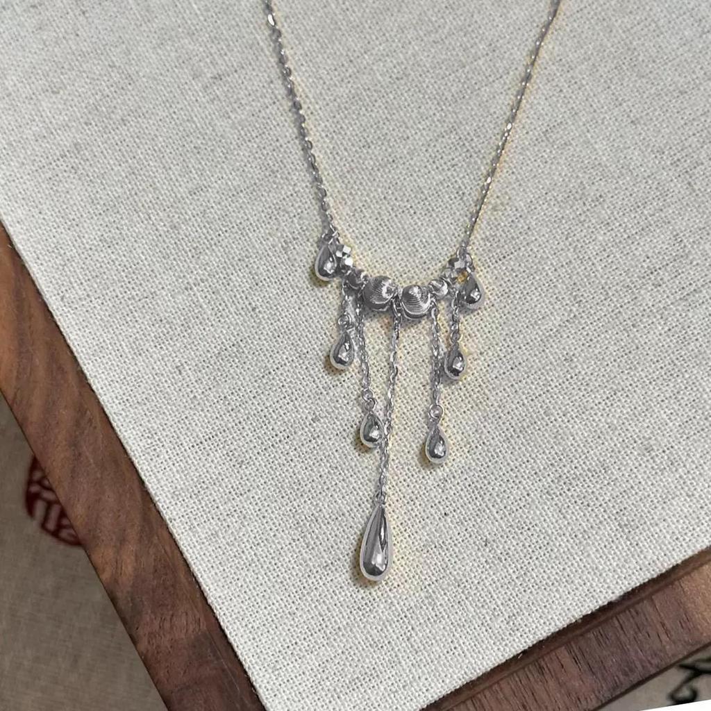 Ожерелье-капля воды с кисточками в стиле «кошачий глаз» для женщин, легкая роскошь, динамичное ожерелье с лазерными бусинами, изысканная и высококлассная цепочка для ключицы