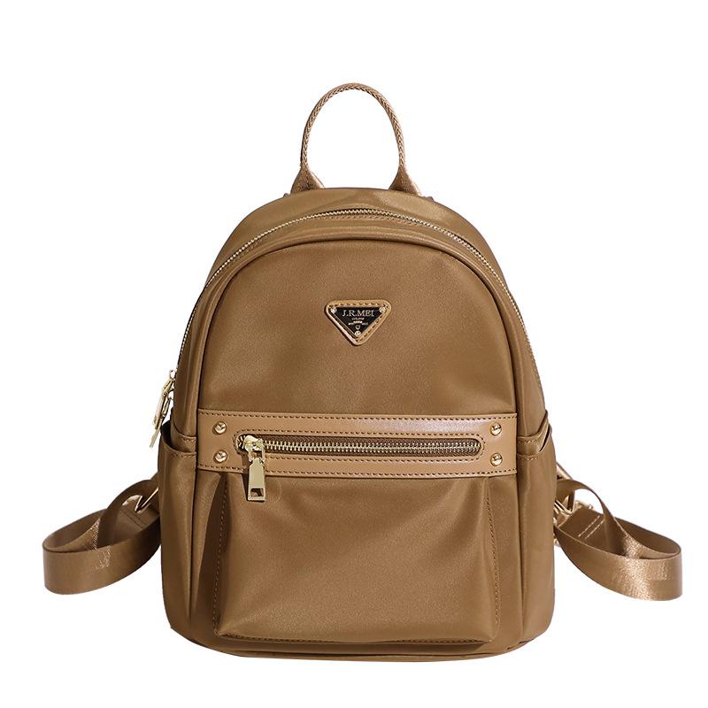 Корейская версия повседневного студенческого легкого рюкзака Новый универсальный и модный женский рюкзак Ткань Оксфорд Поездка для работы