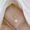 Gold necklace with a four-leaf clover pendant