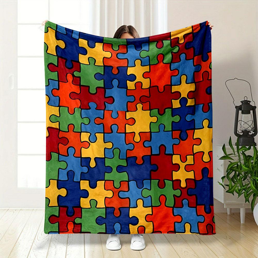 Interlocking colorful puzzle pieces in a random arrangement. for all seasons blanket lunch break throw gift