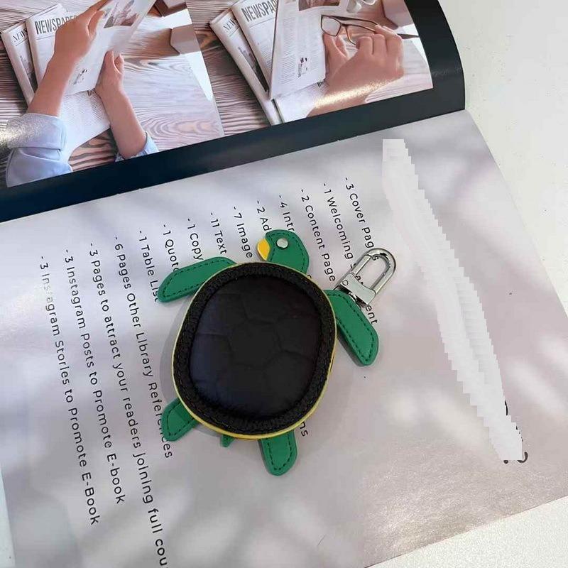 2025 Новый кожаный кулон Head Layer кожаный мини-кошелек для наушников Черепаха кулон Cross Border