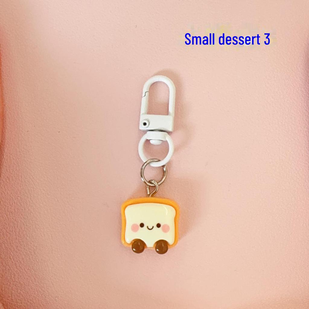 Милый брелок-подвеска в виде мультяшного торта — идеально подходит для студентов, пар и друзей