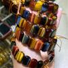 Natural multi-colored tiger's eye bamboo knot bracelet, a birthstone and symbol of wealth.