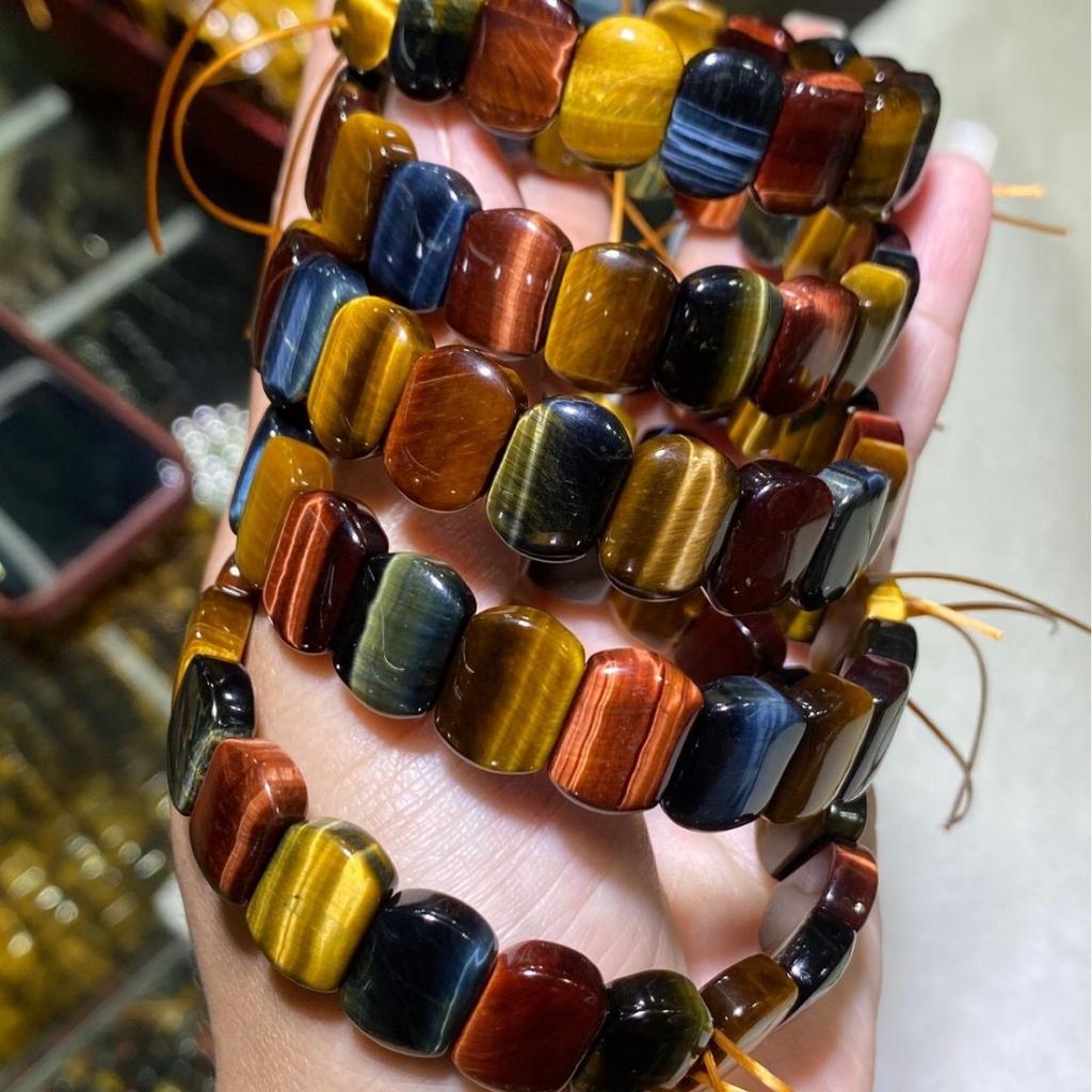 Natural multi-colored tiger's eye bamboo knot bracelet, a birthstone and symbol of wealth.