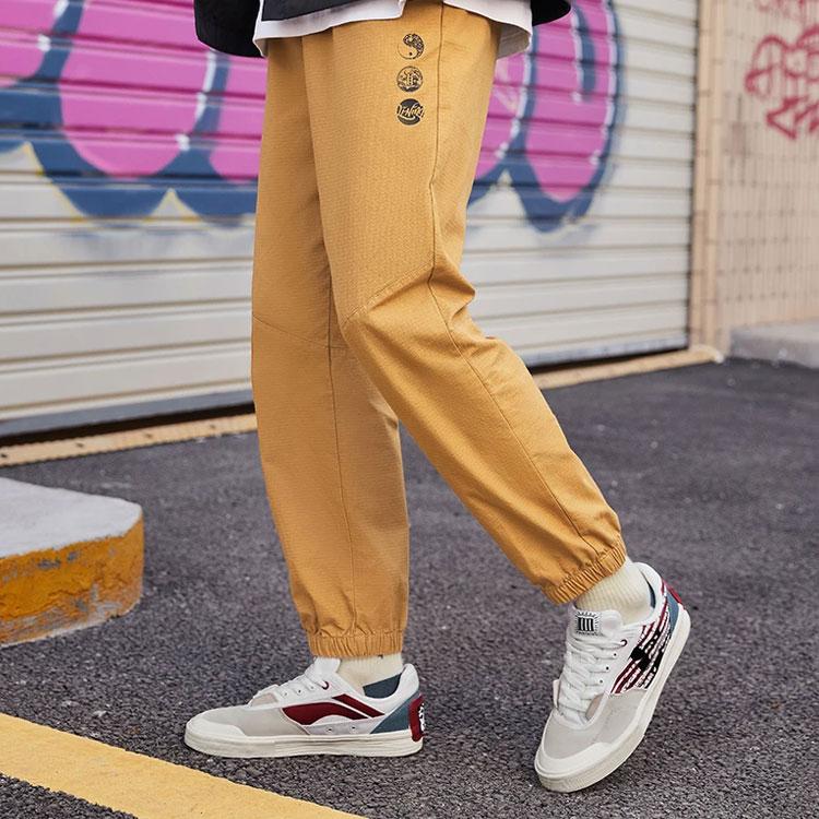Вязаные спортивные штаны Li Ning Унисекс Костяной коричневый AKXR391-2