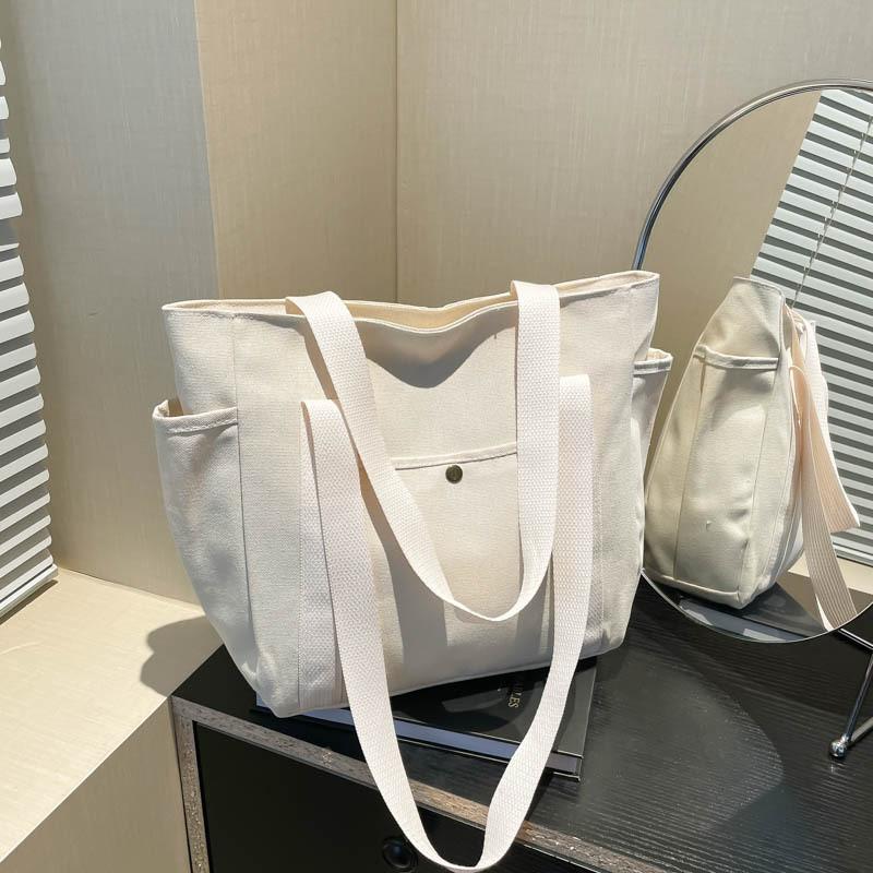Spacious Canvas Tote Bag For Work And Leisure Stylish Commuter Must-have Accessory