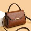 A Fashionable Retro Shoulder Bag with A Niche Design Featuring A Soft Leather Texture Contrasting Colors In A Small Square Bag