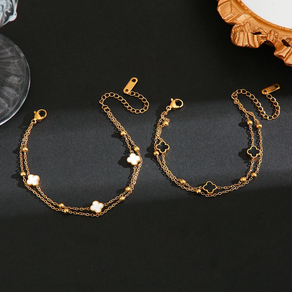 Корейский двухсторонний титановый браслет с четырьмя листочками клевера - элегантные универсальные украшения