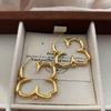 Metal Flower Stud Earrings Women'S Light Luxury Niche Cold Example Temperament Simple Exquisite Natural Art High Sense