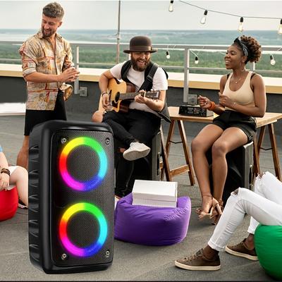 Мощный беспроводной динамик с сабвуфером — элегантная черная беспроводная большая наружная звуковая система с яркой подсветкой в стиле диско