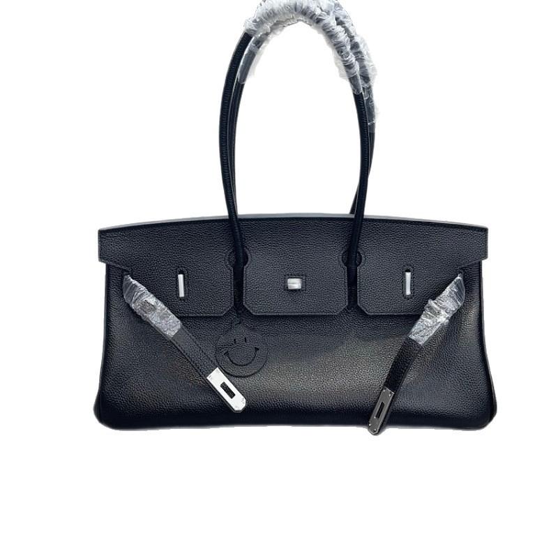 Cross-border trend bag short version oversized portable shoulder bag TOGO first layer cowhide large capacity giant pack