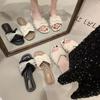 With skirt fairy style square head sandals 2025 summer new French pearl one-word drag women wear flat bottom explosion