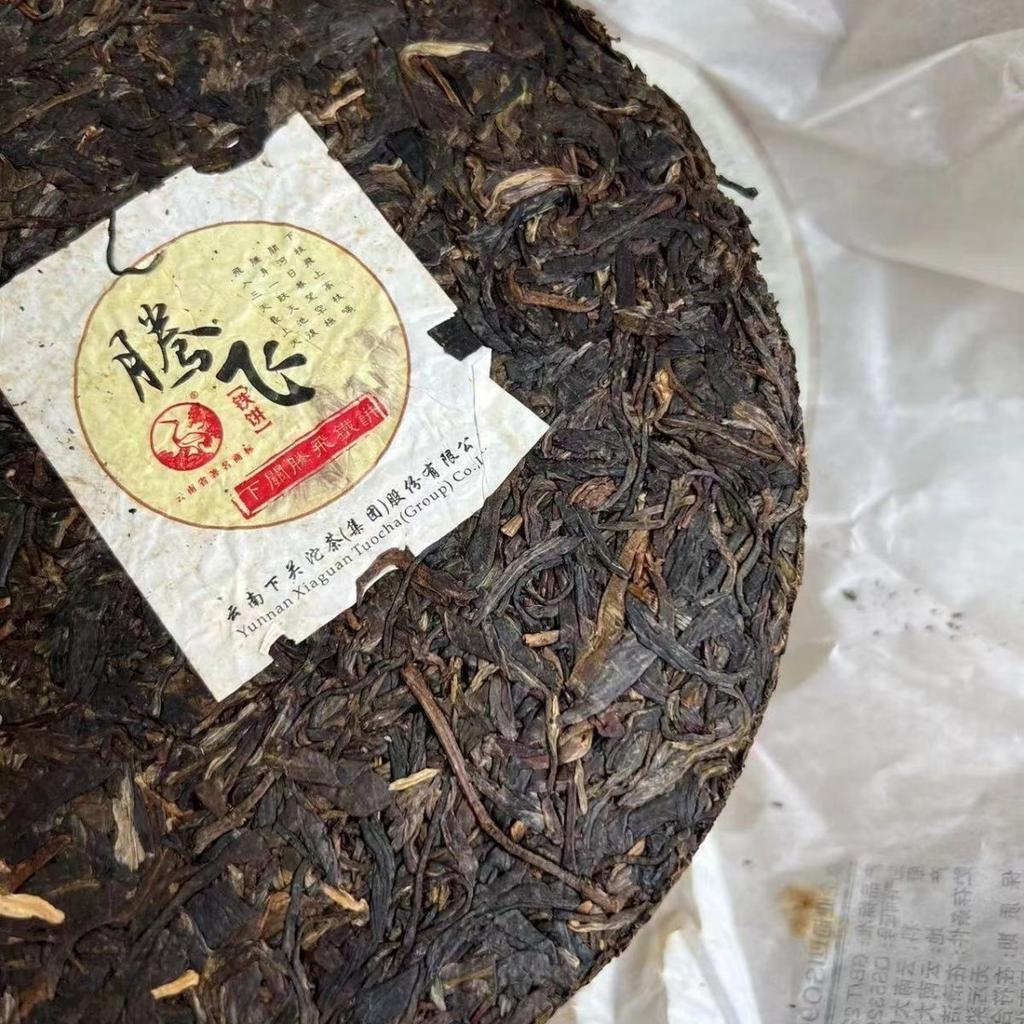 Сягуань 2014 Сырой Пу Эр Летающий твердый пирог Чай Шэн Пуэр 357г