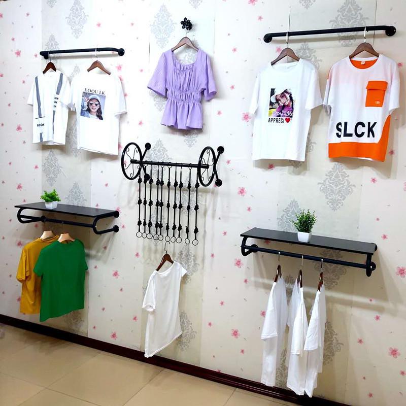 Wall-Mounted Clothing Display Rack for Children's and Women's Apparel