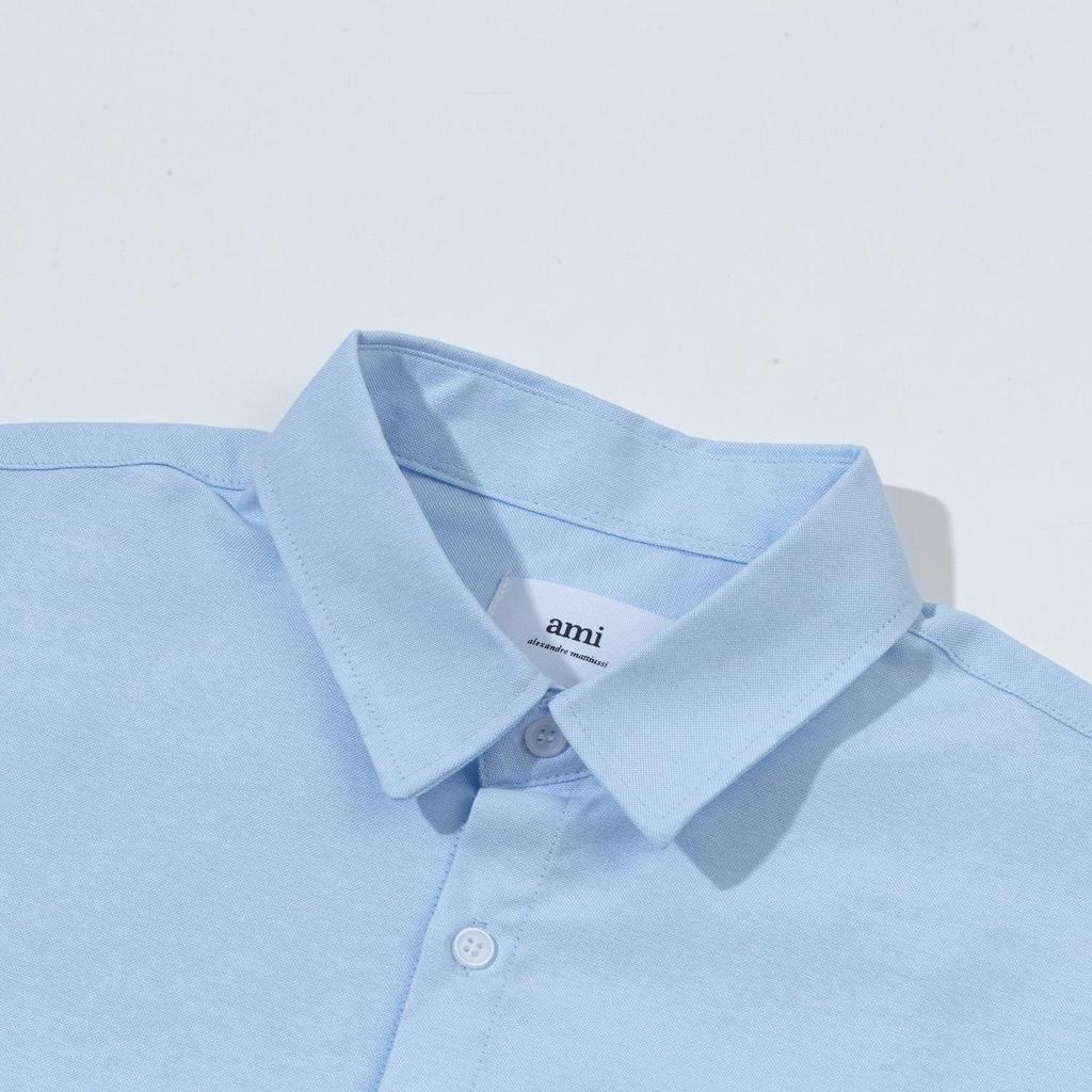 AMI Осень 2025 Новый продукт Нагрудный карман Классическая Невидимая 3D Вышивка Маленькая Любовь Повседневная Хлопковая Однотонная Рубашка с Длинным Рукавом