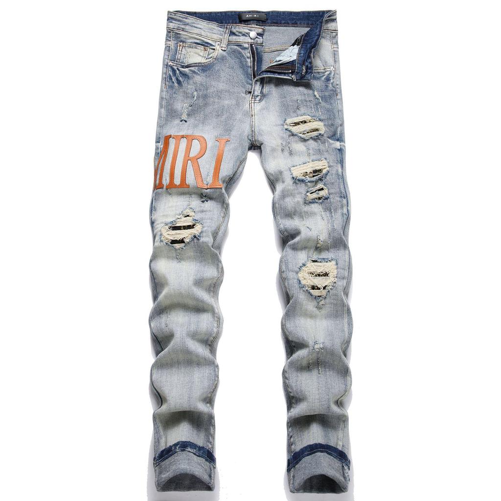 Трендовые мужские джинсы-стрейч с рваными заплатками