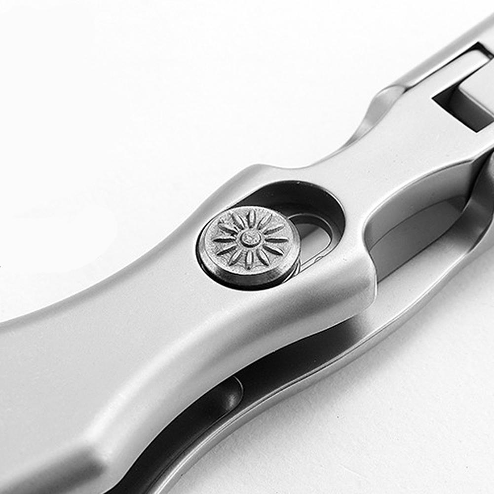 Self-locking folding nail clippers