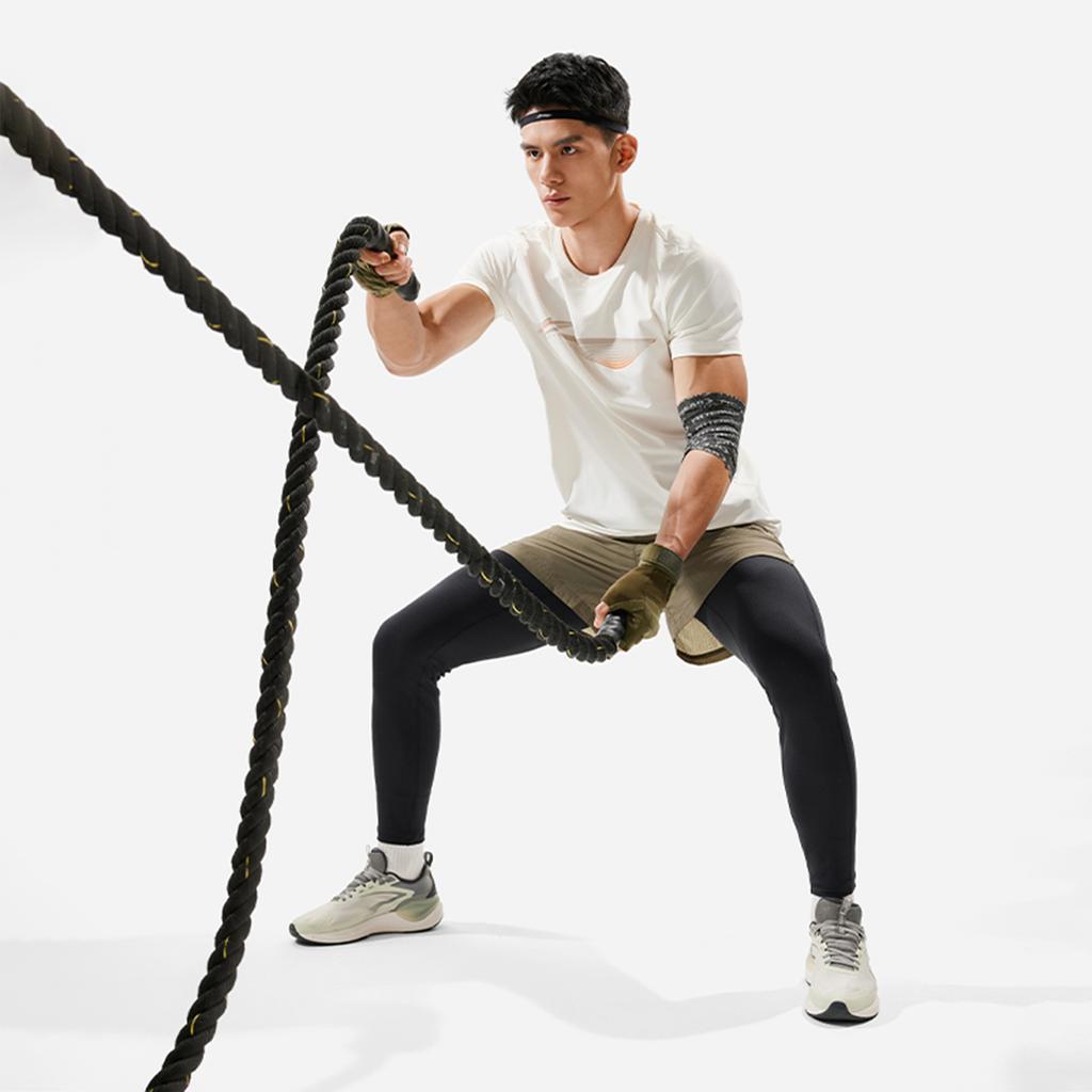 Li-Ning Спортивные длинные брюки Fitness Series, однотонные, облегающие, со средней талией, мужские, черные AULU075-1