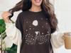 Moon Possum T-Shirt: Opossum In Starry Meadow – Whimsical Nature Night Tee for Animal & Sky Lovers, Linocut Minimal Style Shirt