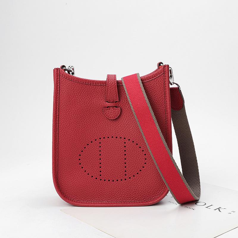 Фабричная оптовая продажа сумка-ведро из натуральной коровьей кожи первого слоя женская сумка с узором личи полый дизайн на одно плечо через плечо полый дизайн