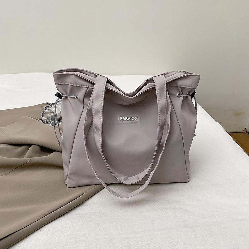 Summer New Simple Casual Cloth Bag Single Shoulder Fashion Lightweight Portable Tote Bag Commuting Class Armpit Bag