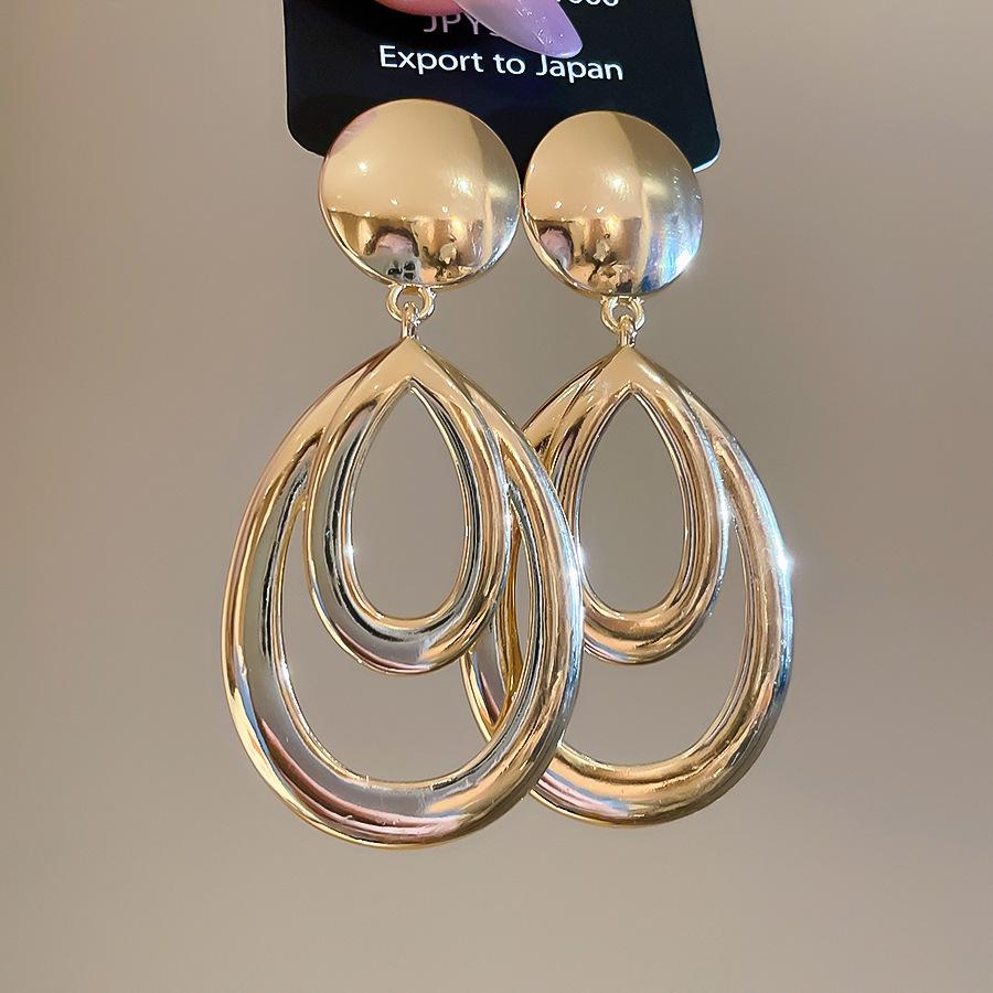 Серьги-подвески с геометрическим ажурным круглым кулоном 'Серебряная игла' в европейском и американском преувеличенном стиле для женщин.