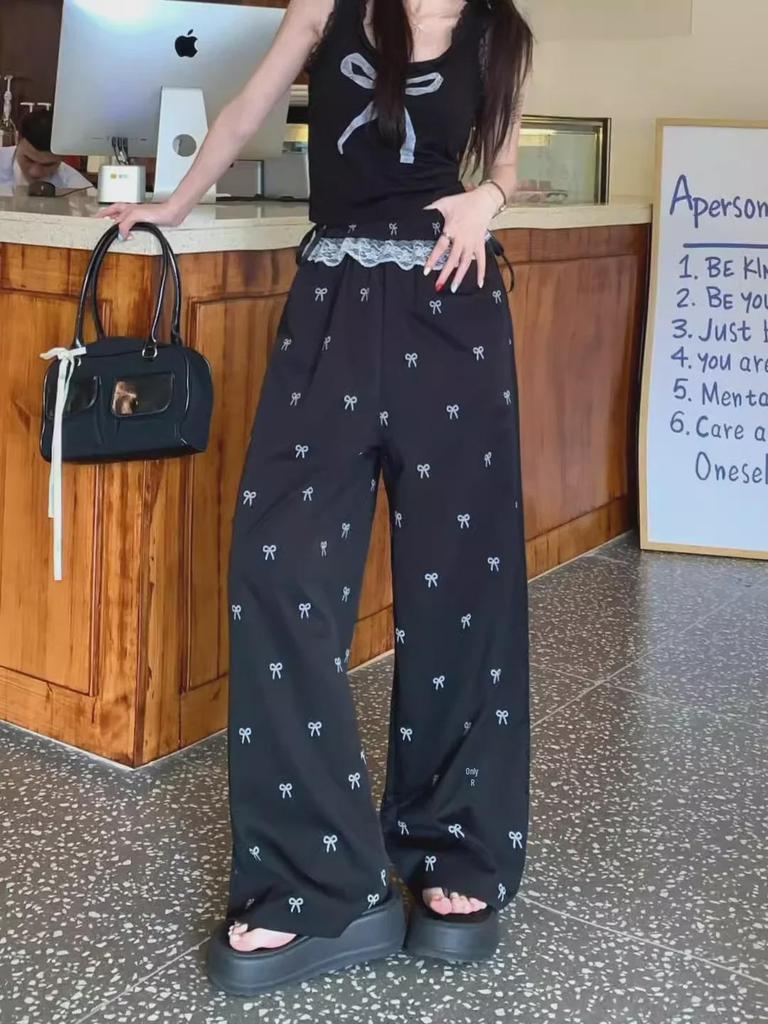 Женские повседневные широкие брюки с высокой талией и кружевными вставками - Коллекция Лето/Осень 2024