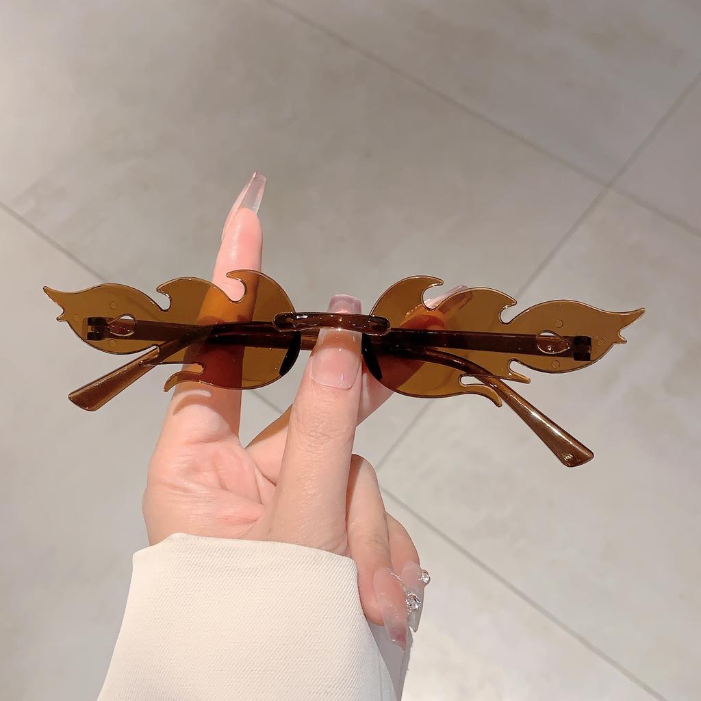 12 пар в наборе Солнцезащитные очки в форме пламени Новая мода Безободковые Конфетный цвет Вечерние очки Модный дизайн Цветные солнцезащитные очки