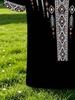 Men's Outdoor Short-Sleeve Polo Shirt, Available in Multiple Sizes. Men's Short-Sleeve Polo with Black Base and Vintage Floral Print, Featuring a