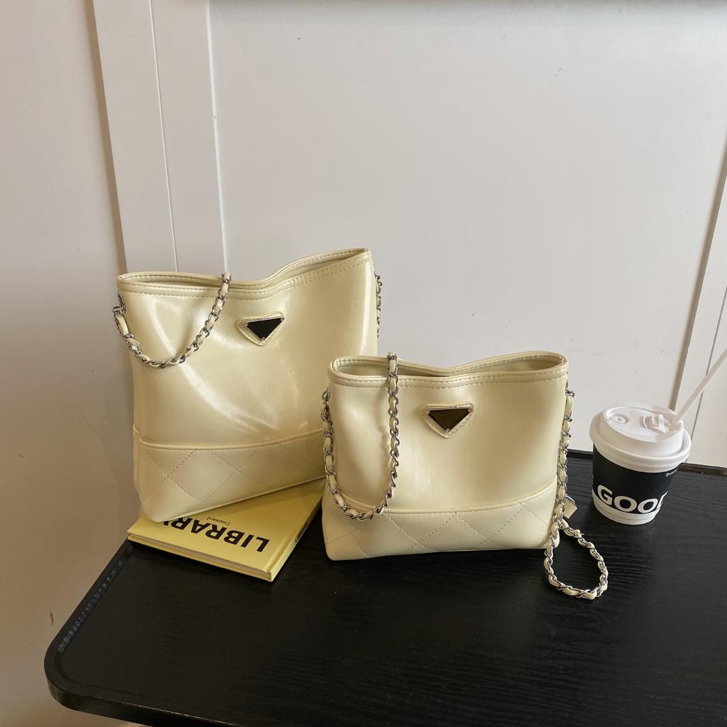 Простые и высококлассные женские сумки, сумки через плечо, нишевые цепочки, сумки-пельмени, вместительные, модные и универсальные женские сумки через плечо.