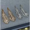 Large Feather Earrings, with Delicate Feather Shapes Emitting Charming Radiance and Aura Lucky Grass Pure Silver earrings+Asian Gold Material