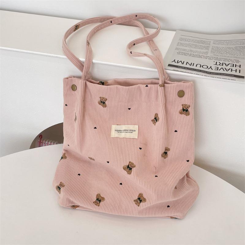 Copyright model, corduroy cartoon printed bear large-capacity portable shoulder bag, student armpit bag for class