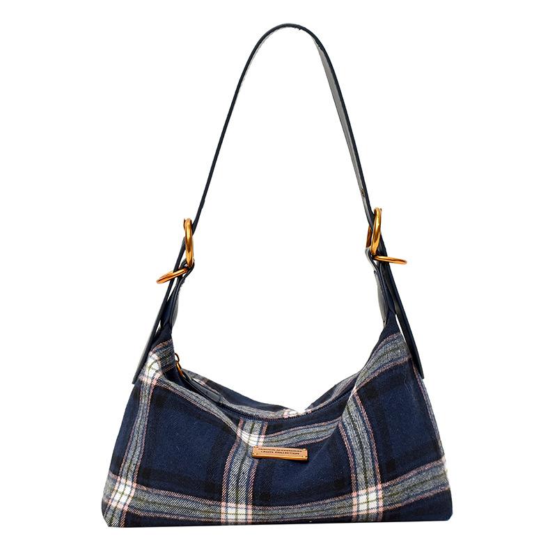 Single-shoulder Underarm Small-sized Casual Tote Bag with Textured Fabric and Adjustable Strap for Commuting.