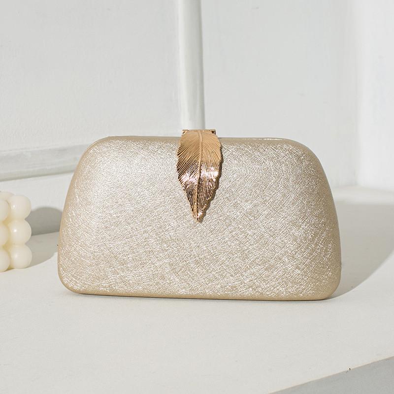 Classic Pu Evening Bag With Metal Leaf Lid And Structured Design For Party Wear