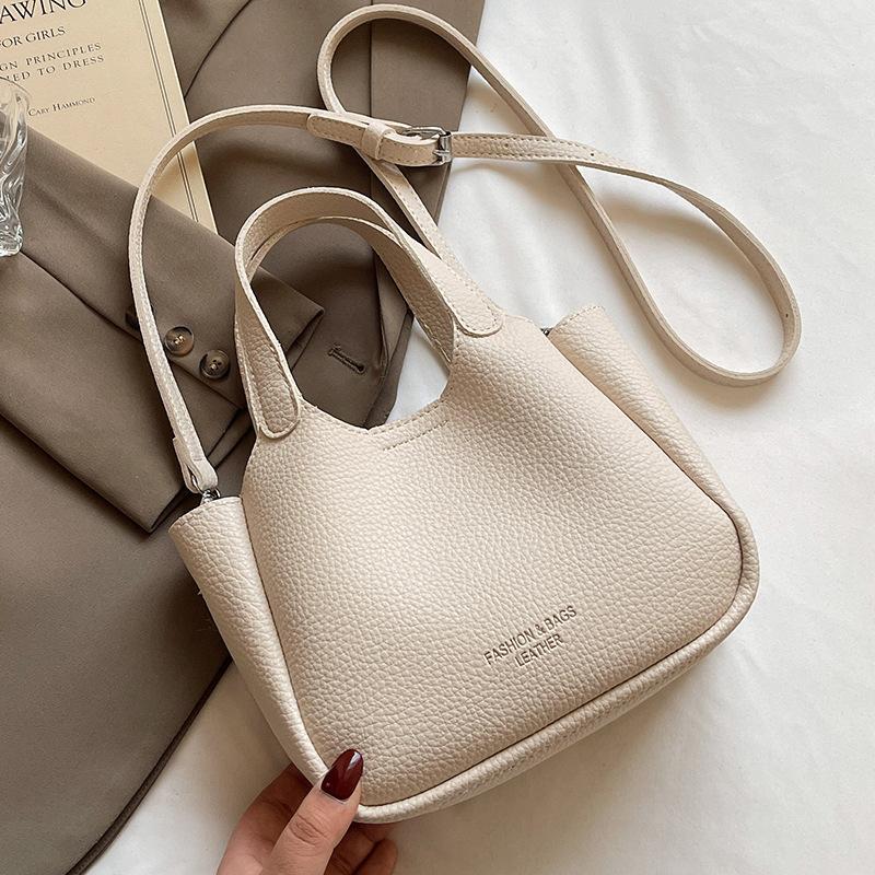 Trend Simple Casual High-end Lychee Pattern Portable Bucket Bag Niche Versatile Commute To Work Solid Color Messenger Bag