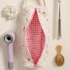 Bow-design hair tool storage bag with zipper. Dustproof for hair dryers and styling tools, ideal for travel and daily use.