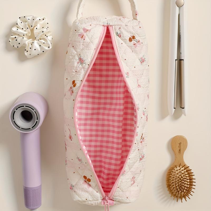 Bow-design hair tool storage bag with zipper. Dustproof for hair dryers and styling tools, ideal for travel and daily use.