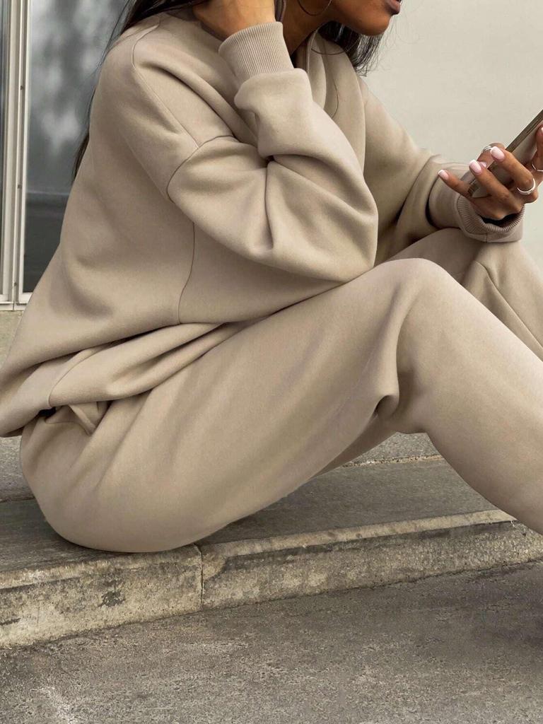 Мода Осень-Зима 2025 Повседневный костюм-двойка однотонного цвета с лацканами на молнии