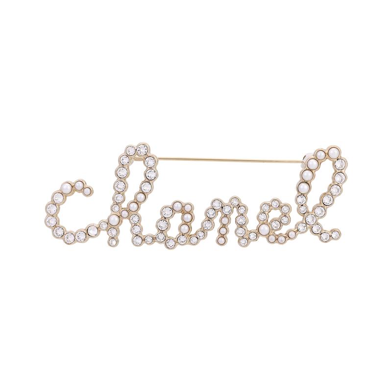 Chanel Брошь-буква золотая со стразами женская золотая