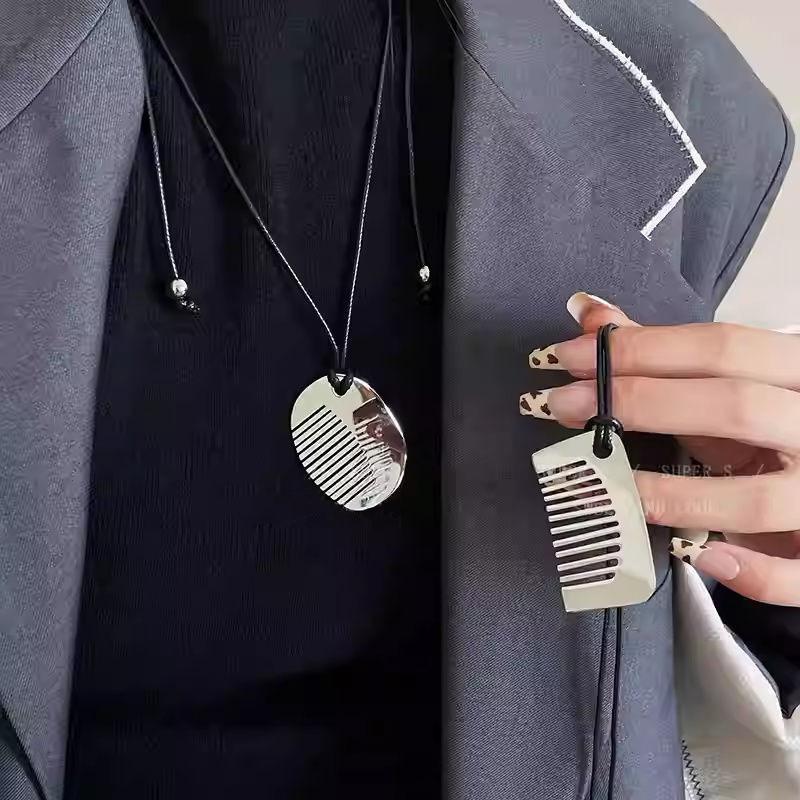 Mirror polished titanium steel comb sweater chain, long pull-out necklace, light luxury, high-end wearing accessories do not fade