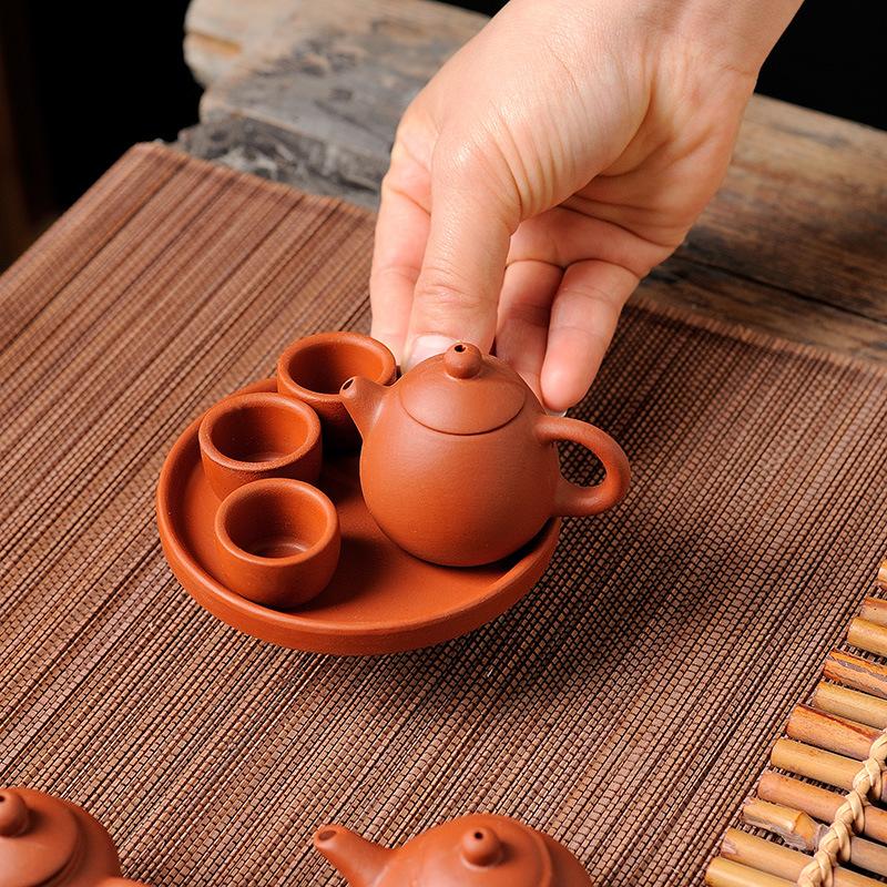 Mini Purple Sand Children's Set Handle Pot Small Teapot Fingertip Pot Tea Pet Pot Can Be Placed To Raise Xishi Small Kung Fu Tea Set