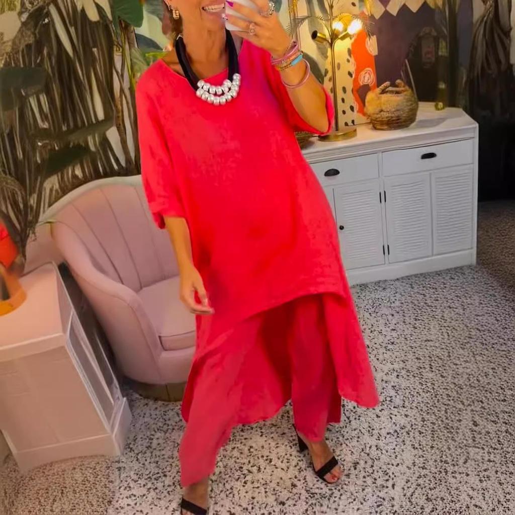 Женский комплект из свободной блузки с асимметричным подолом и брюк широкого кроя в нескольких цветах