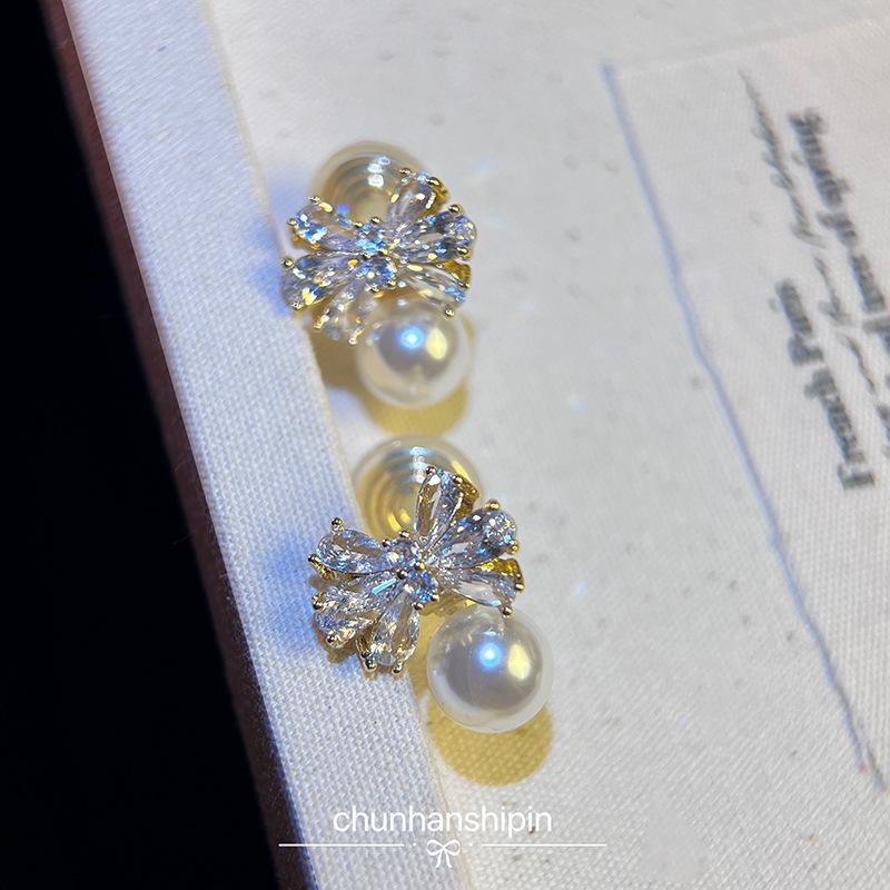 Zircon bow temperament pearl no earrings earrings women's niche design earclips mosquito coil disc high-end earrings