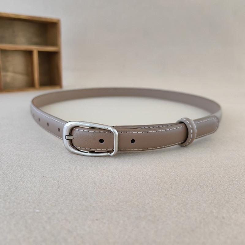 Fashionable Black And Beige Leather Belt With Oval Metal Buckle For Casual Elegance