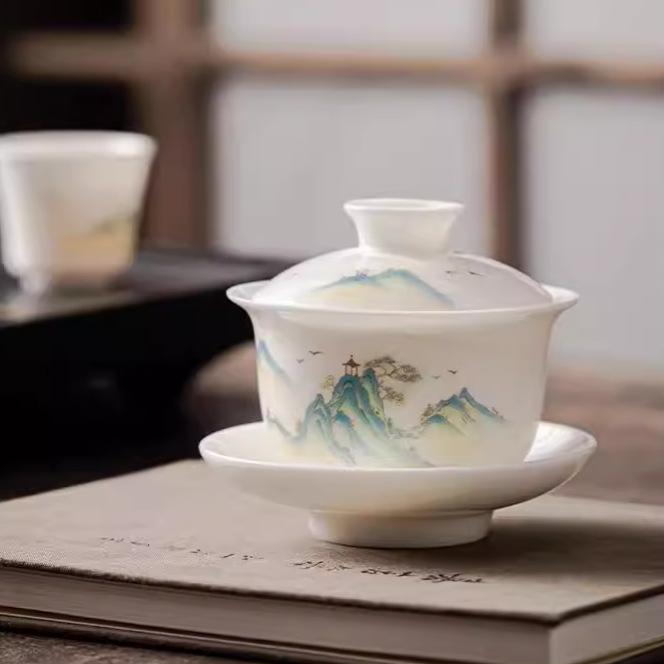 Dehua white porcelain Qianli Jiangshan cover bowl teacup ceramic kung fu tea set Sancai cover bowl suet jade cover cup tea bowl
